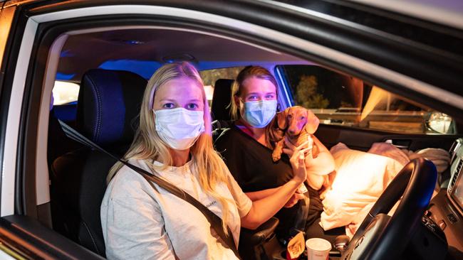 Kelli Rippon and Rachel Bartlett with Meisie were the last two people to be allowed into Victoria on the Hume Freeway.