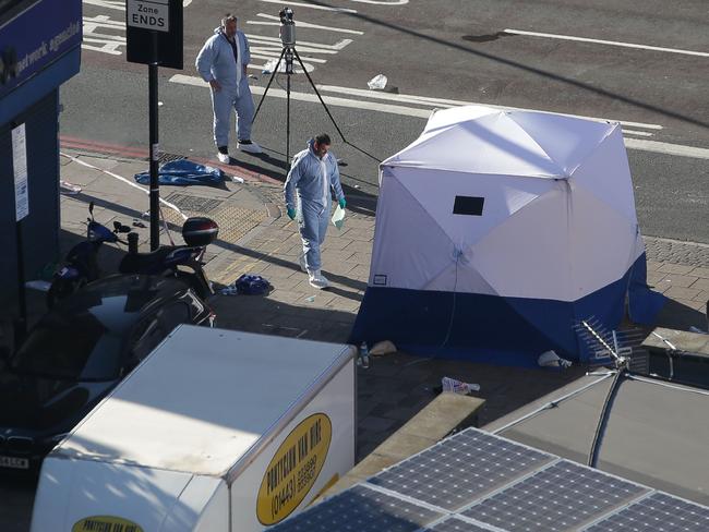 A forensic tent has been erected at the scene. Picture: AFP PHOTO / Daniel LEAL-OLIVAS