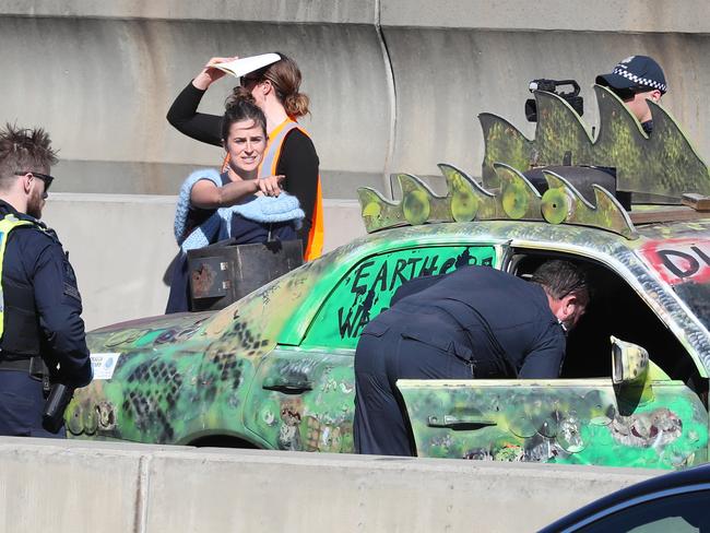 Police search the vehicle. Picture: David Crosling