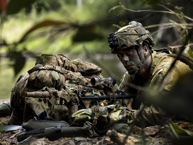 Australian Army soldier Private Maximus Kapnias from 1st Battalion, Royal Australian Regiment competes in the annual 3rd Brigade Military Skills competition at Tully Training Area, Queensland. *** Local Caption *** Members of 3rd Brigade were tested in a series of military skills during the Section Competition 2024, which was held across Lavarack Barracks, Townsville Field Training Area and Tully Training Area, Queensland.The competition saw eight sections from within the Brigade tested over five days on obstacle courses, marksmanship, tactical combat casualty care, communication, navigation, offensive and defensive tactics and physical endurance. PHOTO: LCPL Riley Blennerhassett