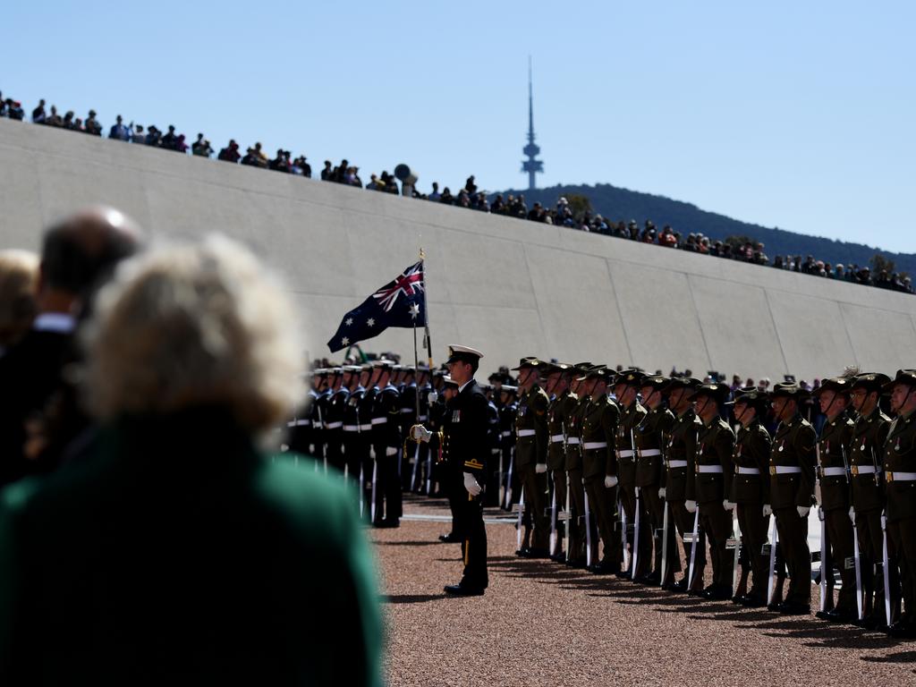 Thousands of Aussies gathered at Parliament House, watching on from the turfed area above. Picture Tracey Nearmy