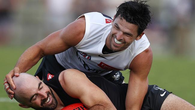 MELBOURNE . 17/02/2023.  AFL . Collingwood intra club practise match at Olympic Park.  Scott Pendlebury has a laugh with Steele Sidebottom after running him down during the 4th qtr.   . Pic: Michael Klein