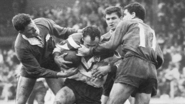 Former rugby league enforcer Kevin Ryan (with ball) is rated by John Sattler as the toughest of opponents. “Boy, could he rattle your ribs,” Sattler said.