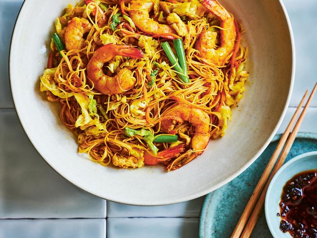 EMBARGO FOR TWAM 20 JULY 2024. FEE MAY APPLY. "The Simple Dinner Edit" by Nicole Maguire. Singapore noodles with prawns. Photo: Supplied