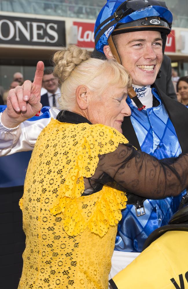 Trainer Udyta Clarke hugs Patrick Moloney after Rich Charm proves too strong at Caulfield. Picture: Getty Images