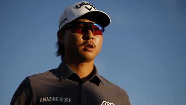 PONTE VEDRA BEACH, FLORIDA - MARCH 11: Min Woo Lee of Australia walks off the 18th green during the third round of THE PLAYERS Championship on THE PLAYERS Stadium Course at TPC Sawgrass on March 11, 2023 in Ponte Vedra Beach, Florida. (Photo by Jared C. Tilton/Getty Images)