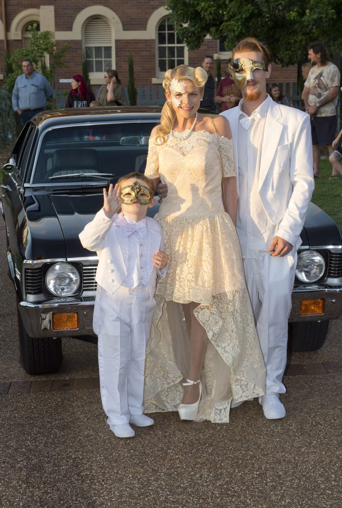 Linken Byrne escorts Milly Wilkinson and Joel Wallace. Picture: Nev Madsen