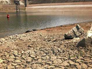 A nearly empty Borumba Dam in November 2002. Gympie landowner Ted Uebergang says some areas of the region are suffering just as much today. Picture: Renee Pilcher