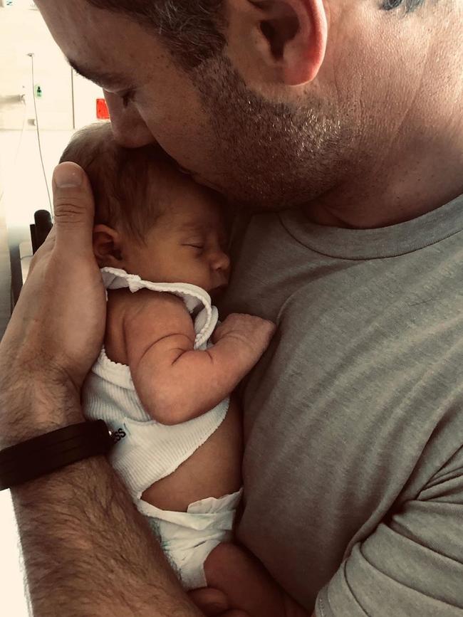 Jake Wall with newborn Frankie. Instagram.