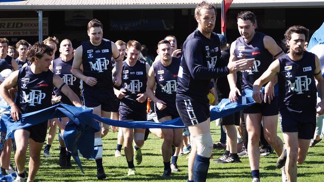 Mount Pleasant run out on to the ground ahead of the grand final. Picture: Nikki Gee.