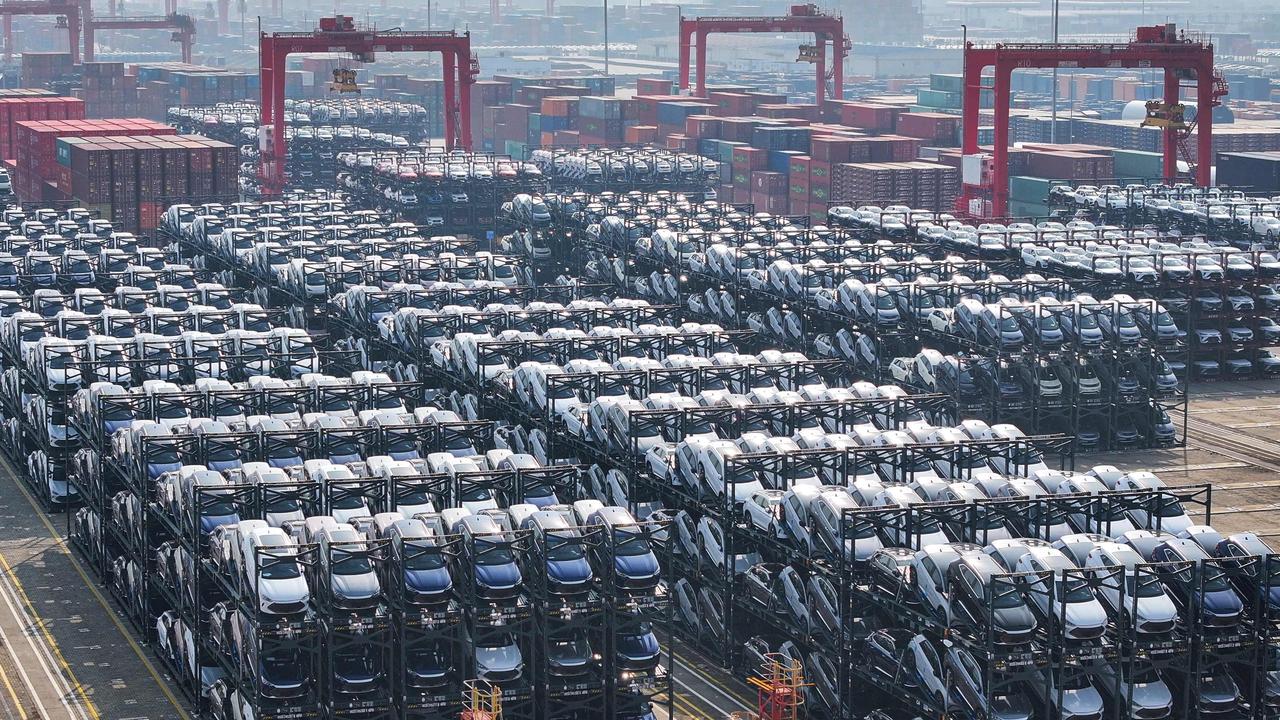 BYD electric cars waiting to be loaded onto a ship.