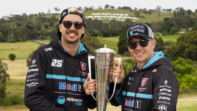 Bathurst 1000 winners Chaz Mostert and Lee Holdsworth with the Peter Brock Trophy. Picture: Getty Images