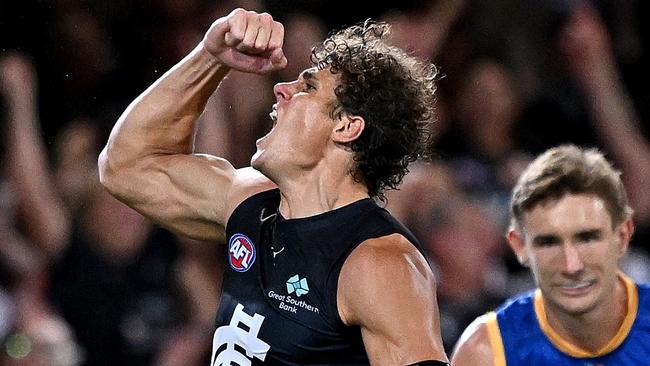 BRISBANE, AUSTRALIA - MARCH 08: Charlie Curnow of the Blues celebrates kicking a goal during AFL Opening Round match between Brisbane Lions and Carlton Blues at The Gabba, on March 08, 2024, in Brisbane, Australia. (Photo by Bradley Kanaris/Getty Images)