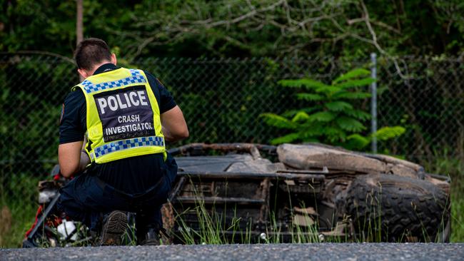 Major Crash Investigation officers at the scene of the ATV buggy crash on Bees Creek Rd on Sunday morning. Picture: Che Chorley