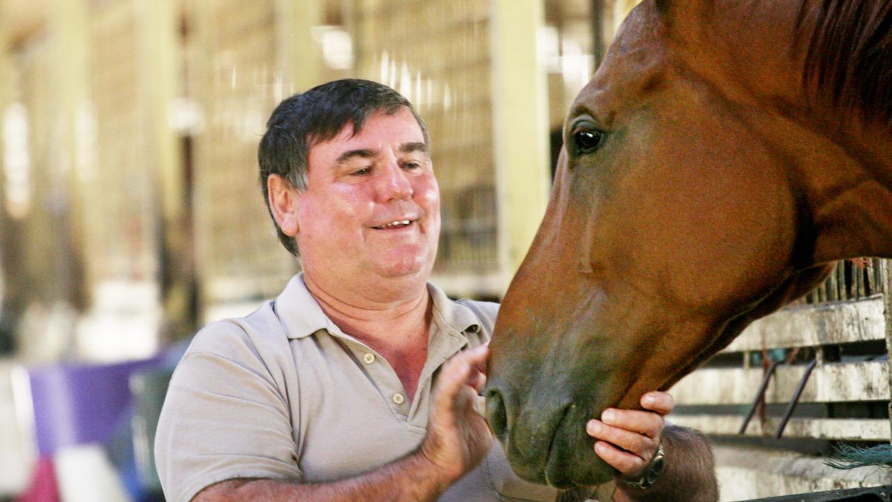 Trainer Mick Mair with Rezone at his Caloundra stables.