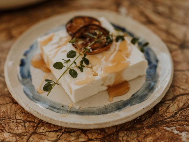 One of Maria’s desserts, a yoghurt-based panna cotta topped with honey and walnuts, which was inspired by chef Christian Ryan’s time in Greece. Picture: Fiona Vail Photography