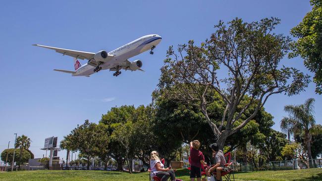 A China Airlines plane lands at Los Angeles International Airport.