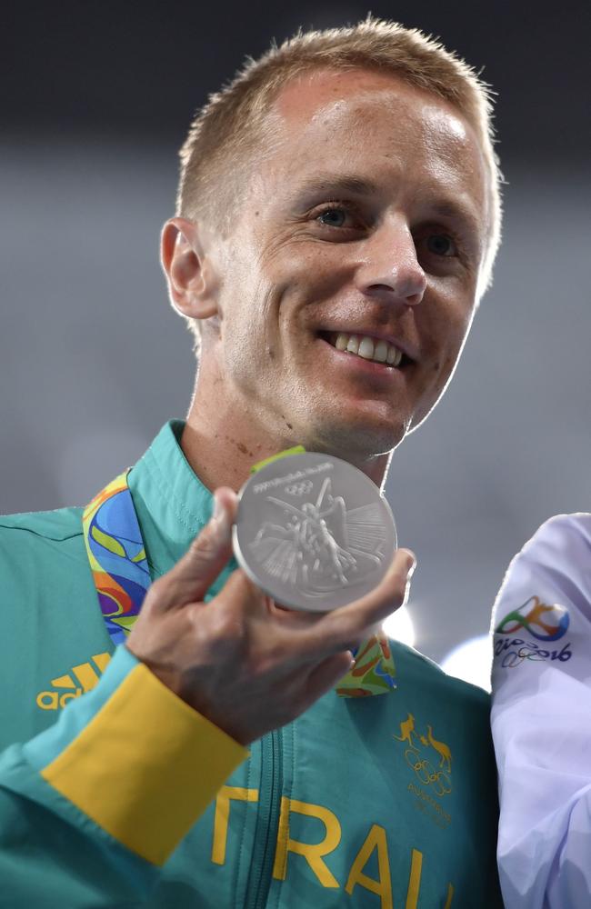 Australia's Jared Tallent on the podium after being awarded his silver medal for the 50km walk.