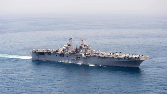 (FILES) In this file photo taken on June 15, 2016 released by the US Navy, the amphibious assault ship USS Boxer transits The Gulf to conduct missions in support of Operation Inherent Resolve. - The US military shot down an Iranian drone on July 18, 2019 that came within 1,000 yards of one of its naval vessels in the Strait of Hormuz, President Donald Trump said."The (USS) Boxer took defensive action against an Iranian drone which had closed into a very, very near distance, approximately 1,000 yards," Trump announced at the White House. (Photo by Craig Z. Rodarte / US NAVY / AFP) / RESTRICTED TO EDITORIAL USE - MANDATORY CREDIT "AFP PHOTO /US NAVY/Greg Z. RODARTE/HANDOUT" - NO MARKETING NO ADVERTISING CAMPAIGNS - DISTRIBUTED AS A SERVICE TO CLIENTS