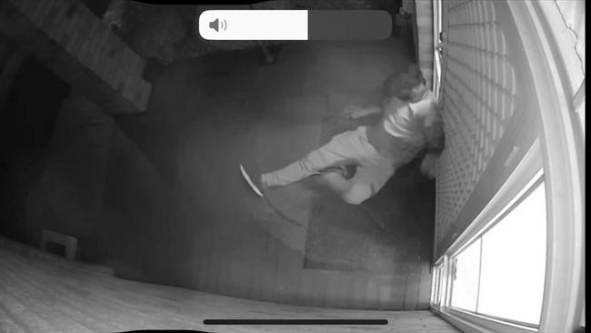 CCTV footage captured Hawre Sherwani collapsing on the door of a Caroline Springs property after being shot. Picture: 7News