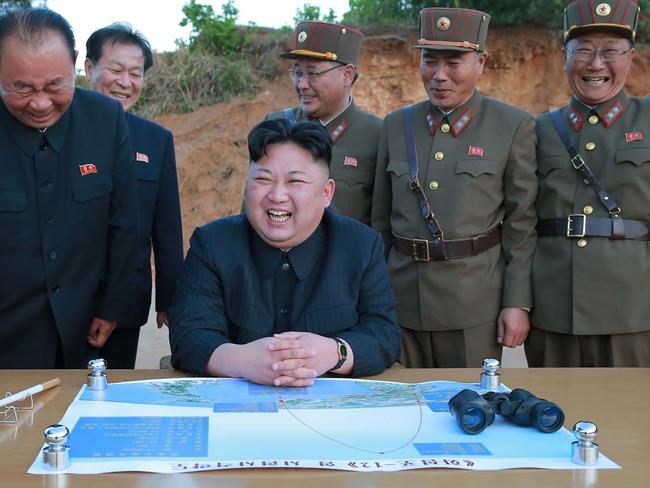 North Korean leader Kim Jong-un pictured during a recent test of a ground-to-ground medium long-range strategic ballistic rocket Hwasong-12. Picture: AFP