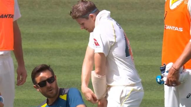 Steve Smith received treatment for an arm injury. Picture: Nine