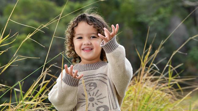 Toddler Winner: Suni Latu, 3, with proud parents Drew and Sunia Taufaeteau. Picture: Patrick Woods.