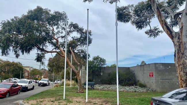 The flagpoles that were erected outside Yarra council's Clifton Hill depot.