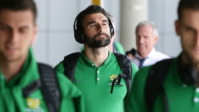 Captain Mile Jedinak. The Socceroos arrive in Brisbane for the Asian Cup. Pic Peter Wallis