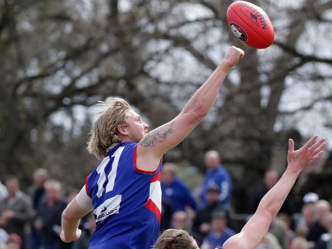 Daniel Bramich spoils the ball. Picture: Mark Dadswell/AAP