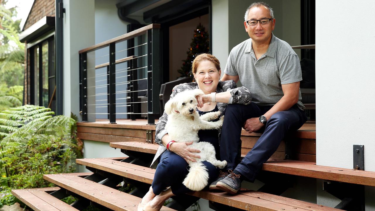 Noz and Kathryn Ogawa with dog Rosie, are selling their Mosman home at 46 Burrawong Ave. Picture: Tim Hunter.