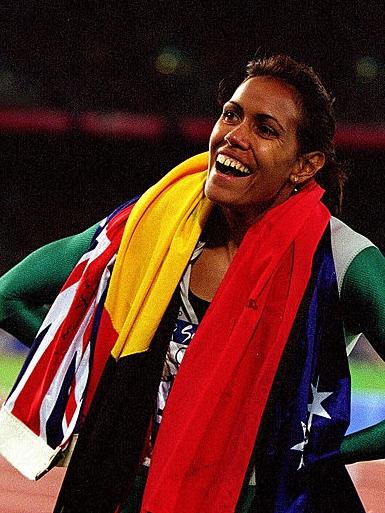 Cathy Freeman after winning gold in the Women's 400m at the Sydney Olympic Games in 2000. Picture: Nick Wilson/ALLSPORT