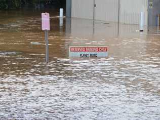 The carpark behind Sportspower Super Warehouse Lismore was completely submerged around 10am Sunday. Picture: Cathryn Mclauchlan