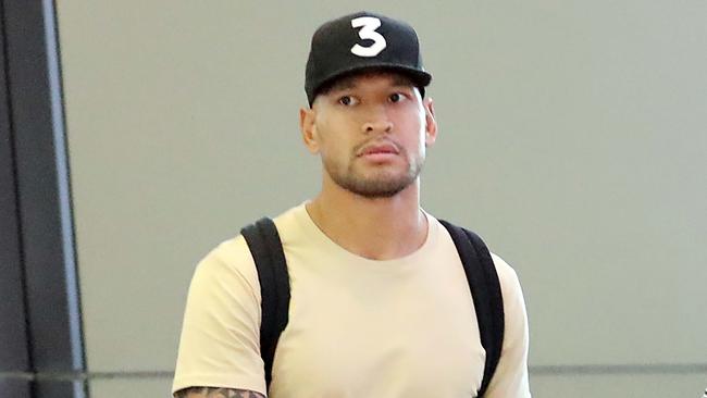 A dejected Israel Folau flees Sydney after his $4 million rugby contract is torn up. Picture: Diimex