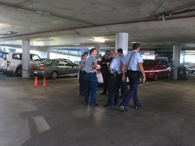 Police officers at Highpoint shopping centre, Ashgrove, after Ali France was pinned between two cars in 2011. Picture: Glenn Barnes