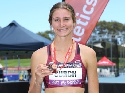 Surch with her bronze medal.