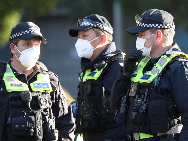 MELBOURNE, AUSTRALIA - NewsWire Photos JULY 05, 2020: Police on the scene at Government Housing towers on Racecourse road in Flemington which have been locked down by the Victorian Government in an attempt to stop the outbreak of COVID-19. Picture: David Crosling