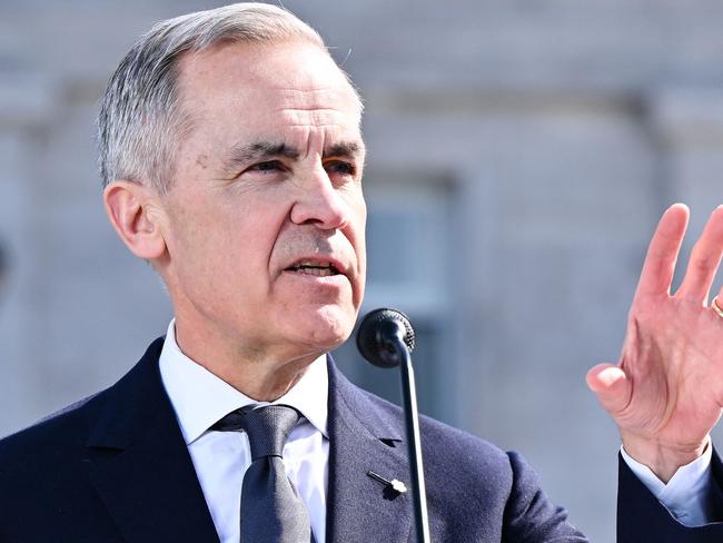 OTTAWA, CANADA - MARCH 14: New Canadian Prime Minister Mark Carney addresses the media after being sworn in at Rideau Hall on March 14, 2025 in Ottawa, Ontario, Canada. Carney, a former central banker, replaces Justin Trudeau as Prime Minister and Liberal Party leader as the country faces a trade war with the United States.   Minas Panagiotakis/Getty Images/AFP (Photo by Minas Panagiotakis / GETTY IMAGES NORTH AMERICA / Getty Images via AFP)