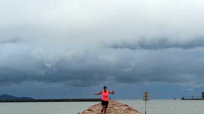 Joanna Keune takes a morning job on the Townsville breakwater. Picture: Evan Morgan