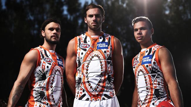 Zac Williams, Jeremy Finlayson and Ian Hill unveil the Giants’ indigenous jumper. Picture: Phil Hillyard