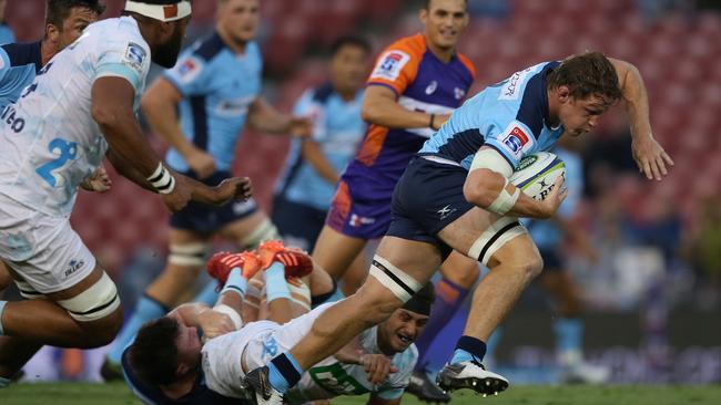 Michael Hooper takes the ball up for the Waratahs in last weekend’s Super Rugby clash against the Auckland Blues. Rugby union is one of Kayo’s key sports. Picture: Getty Images