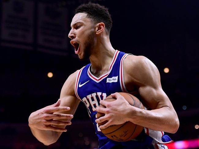 LOS ANGELES, CA - NOVEMBER 13: Ben Simmons #25 of the Philadelphia 76ers reacts to his rebound during a 109-105 win over the LA Clippers at Staples Center on November 13, 2017 in Los Angeles, California.   Harry How/Getty Images/AFP == FOR NEWSPAPERS, INTERNET, TELCOS & TELEVISION USE ONLY ==