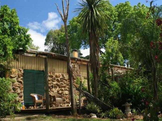 Mitchell’s 222ha cattle farm at Caffreys Flat includes a stone and timber house.