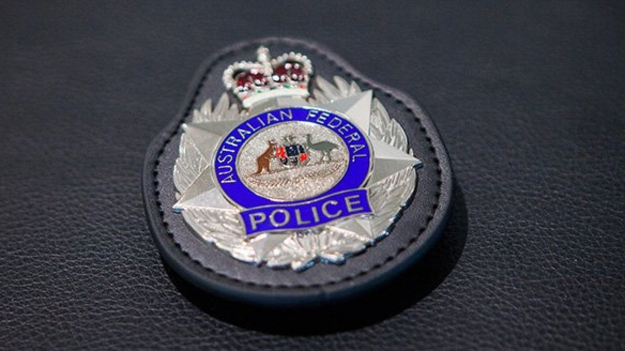 The man allegedly used a fake police badge to claim he was an AFP officer. Picture: AFP