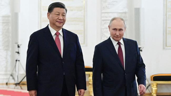 Xi Jinping with Putin in March. Picture: AFP