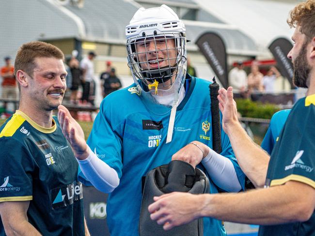 Tassie goalkeeper Magnus McCausland is congratulated after his penalty shootout heroics. Picture: Liam Boric/Liberty Hockey One League