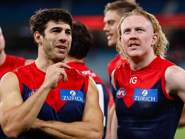 MELBOURNE, AUSTRALIA - APRIL 29: Clayton Oliver and Christian Petracca of the Demons are seen during the 2023 AFL Round 07 match between the Melbourne Demons and the North Melbourne Kangaroos at the Melbourne Cricket Ground on April 29, 2023 in Melbourne, Australia. (Photo by Dylan Burns/AFL Photos via Getty Images)