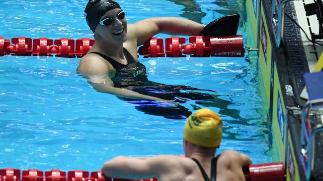 Ledecky, top, reacts after the race. Picture: AFP