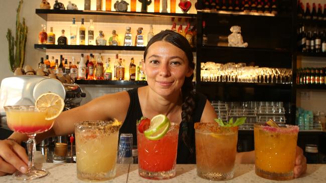 Bartender Pamela Arciniega with drinks. Picture: Glenn Hampson