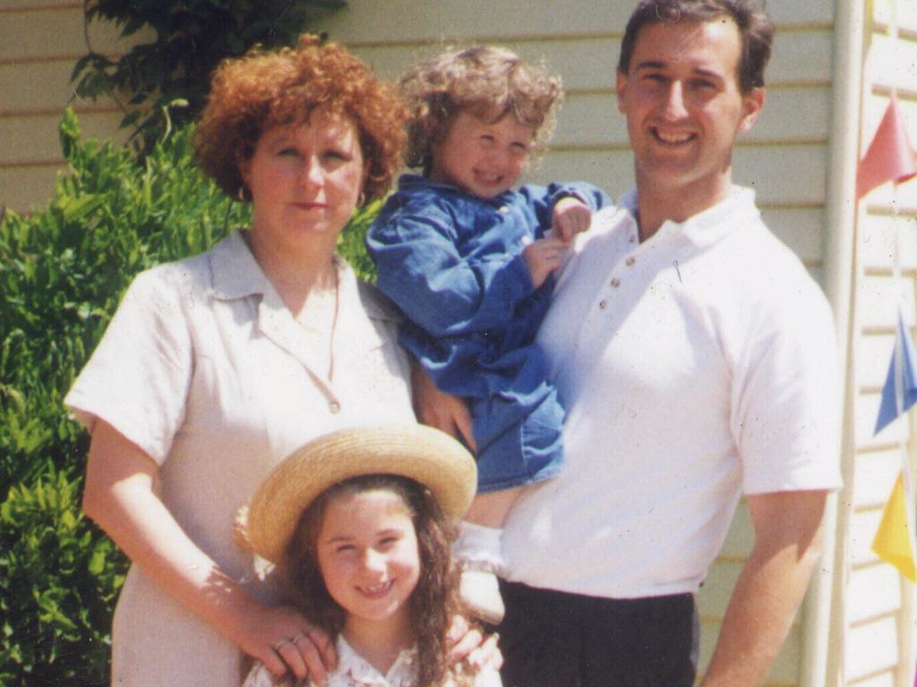 Walter Mikac with his wife Nanette and daughters Alannah and Madeline.